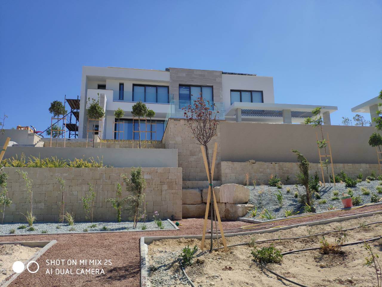 Landscaped stone terraces and planting at the Pissouri residence